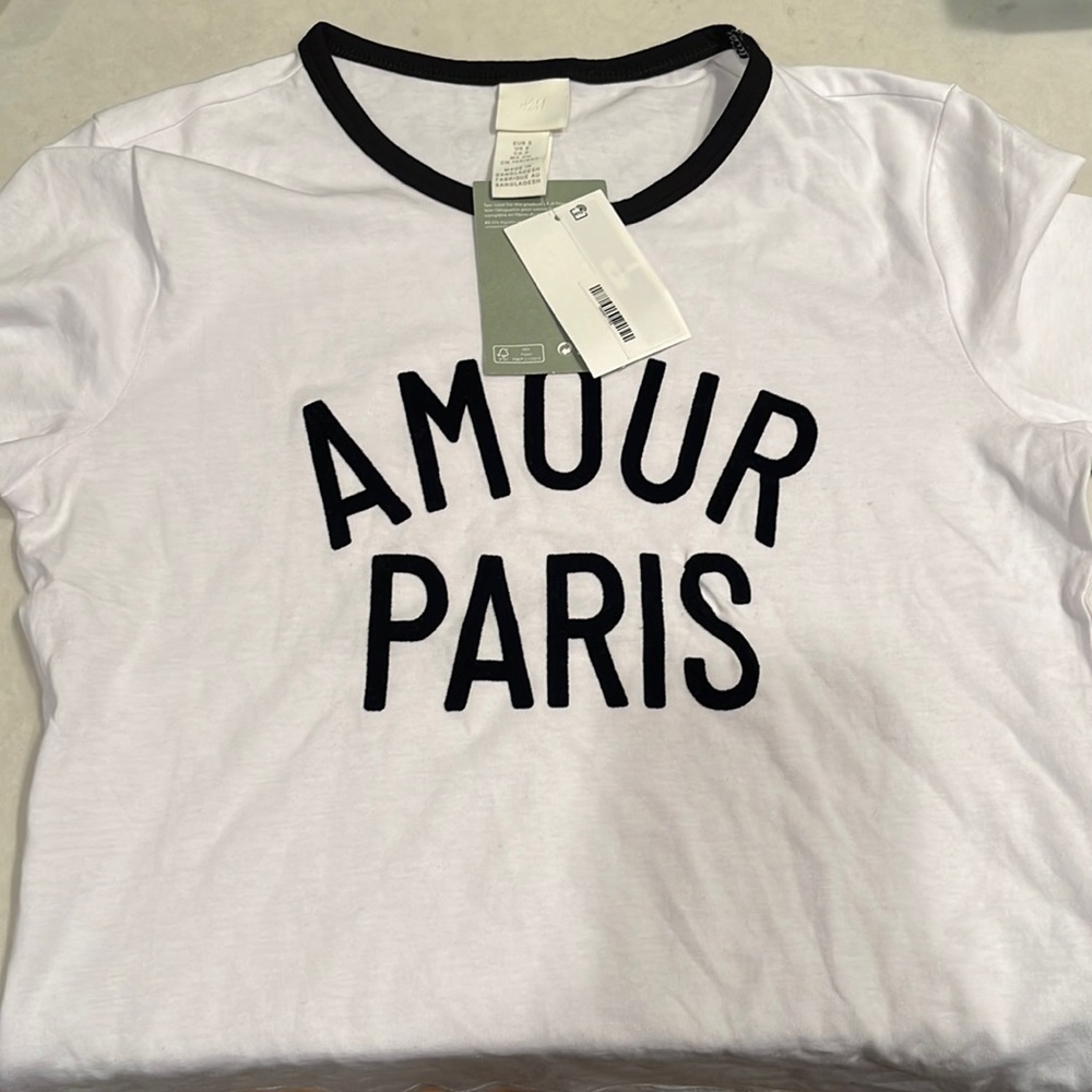Cute t! Never worn